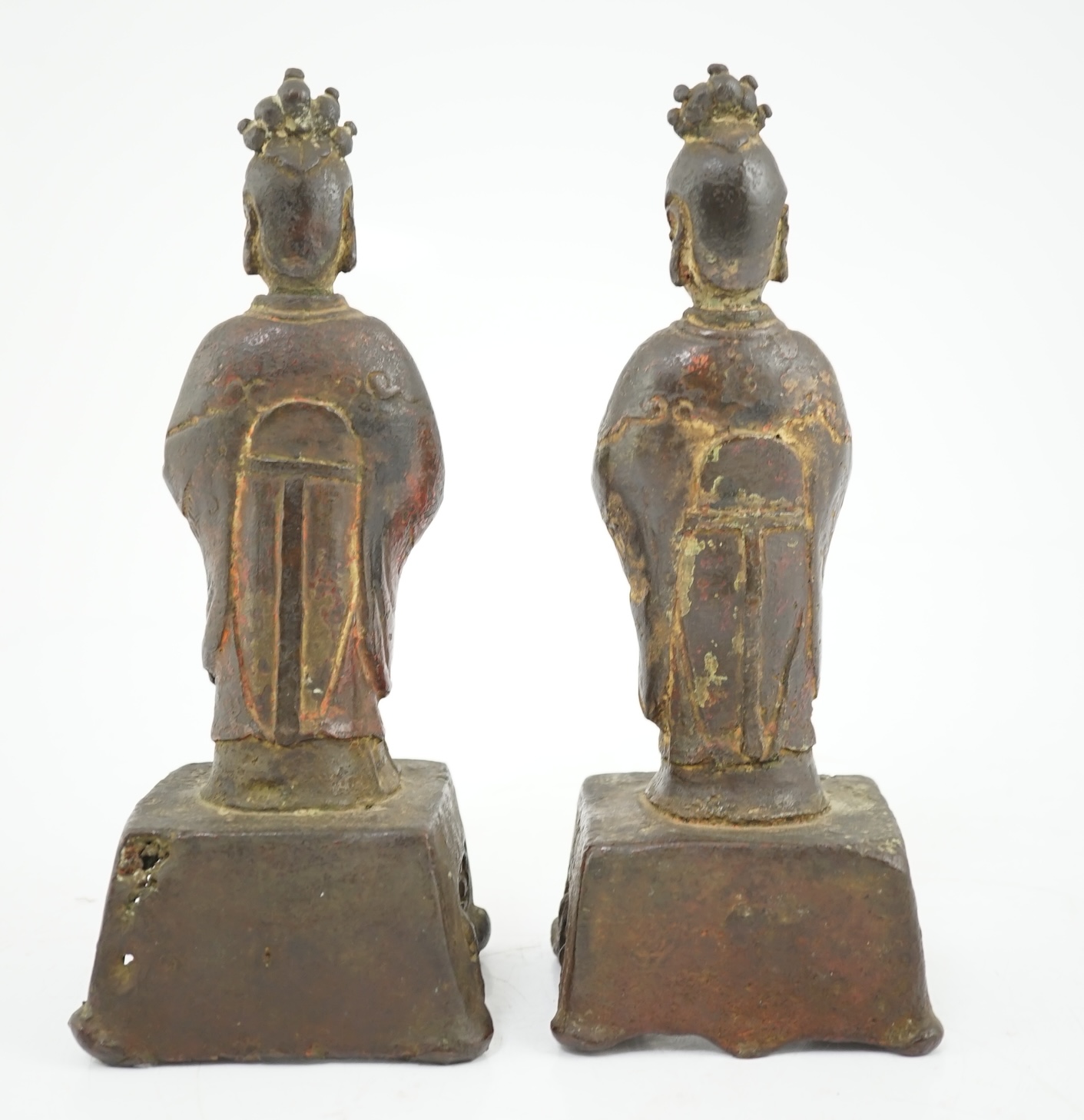 A pair of Chinese Ming bronze figures of attendants